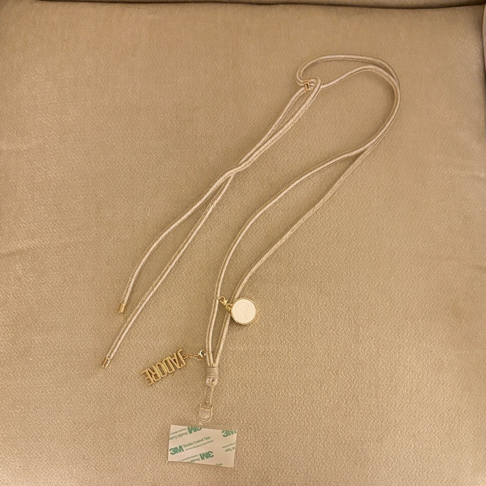 Dior Phone Accessory Gold